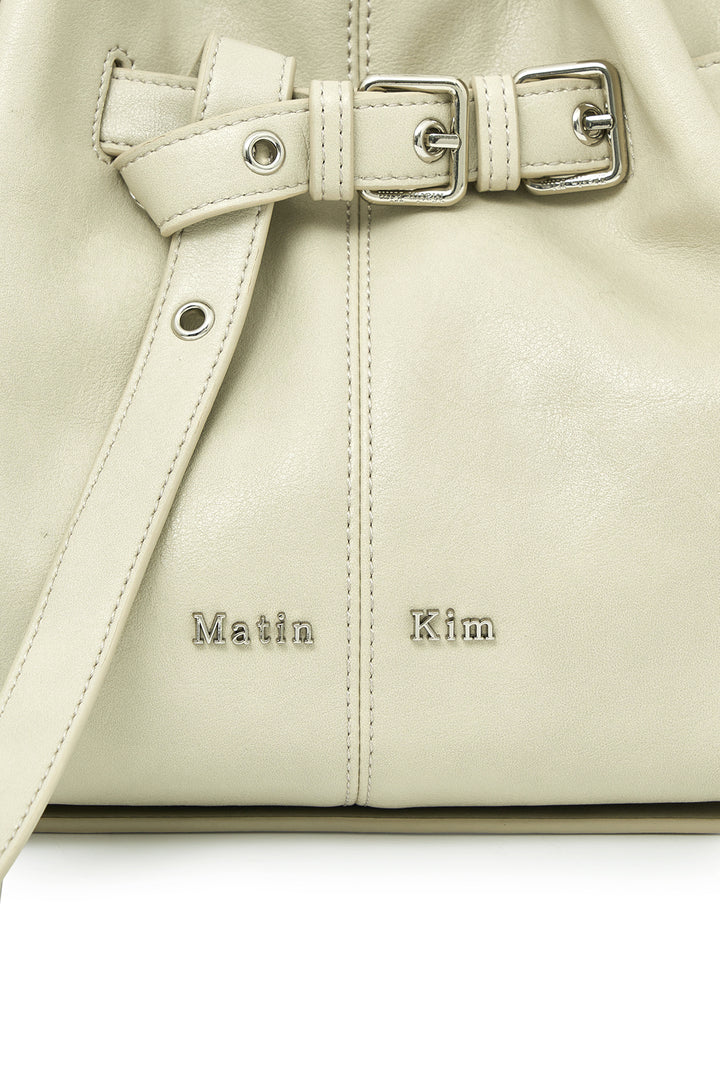 Matin Kim Belted Volunn Small Bucket Bag — Ivory