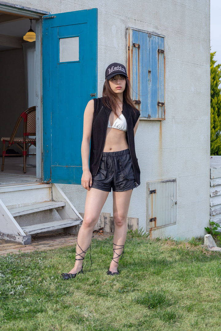 Matin Kim Back Logo High Neck Knit Vest — Black