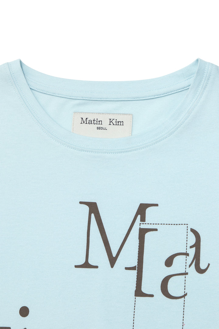 Matin Kim Patchwork Graphic Logo Tee — Light Blue