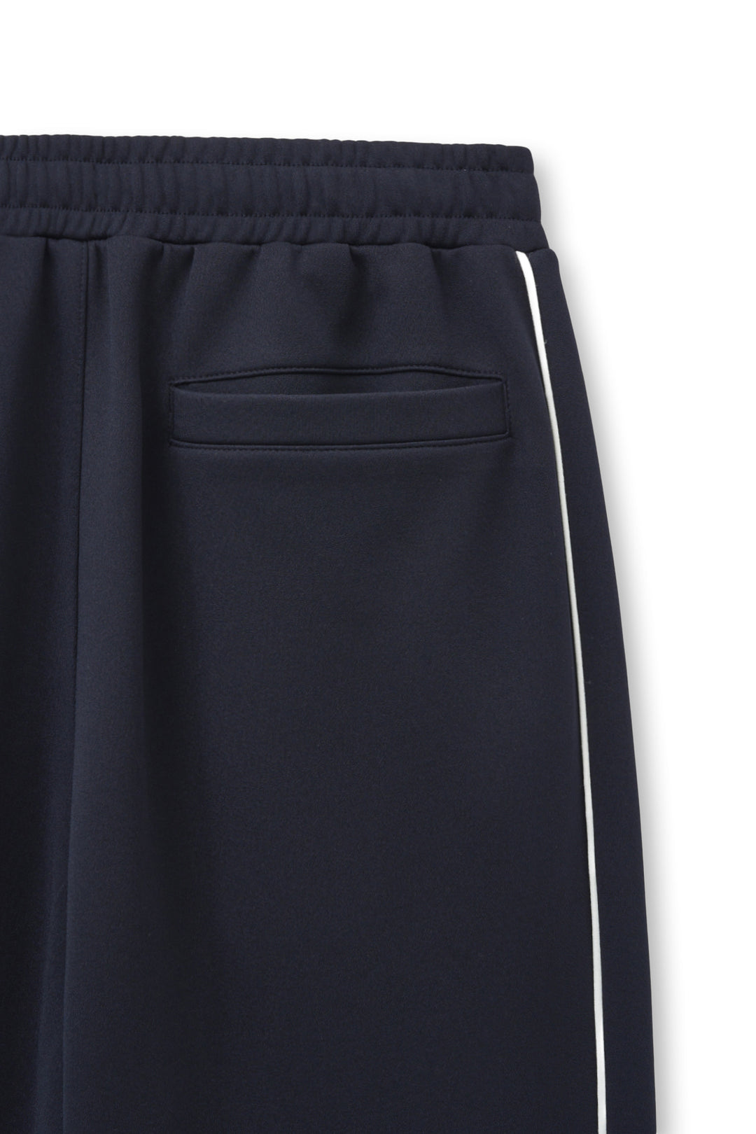 Matin Kim Heart Logo Track Pants — Navy blue