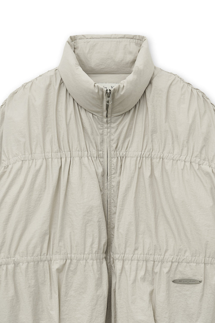 Matin Kim High Neck Shirring Down Jumper — Beige