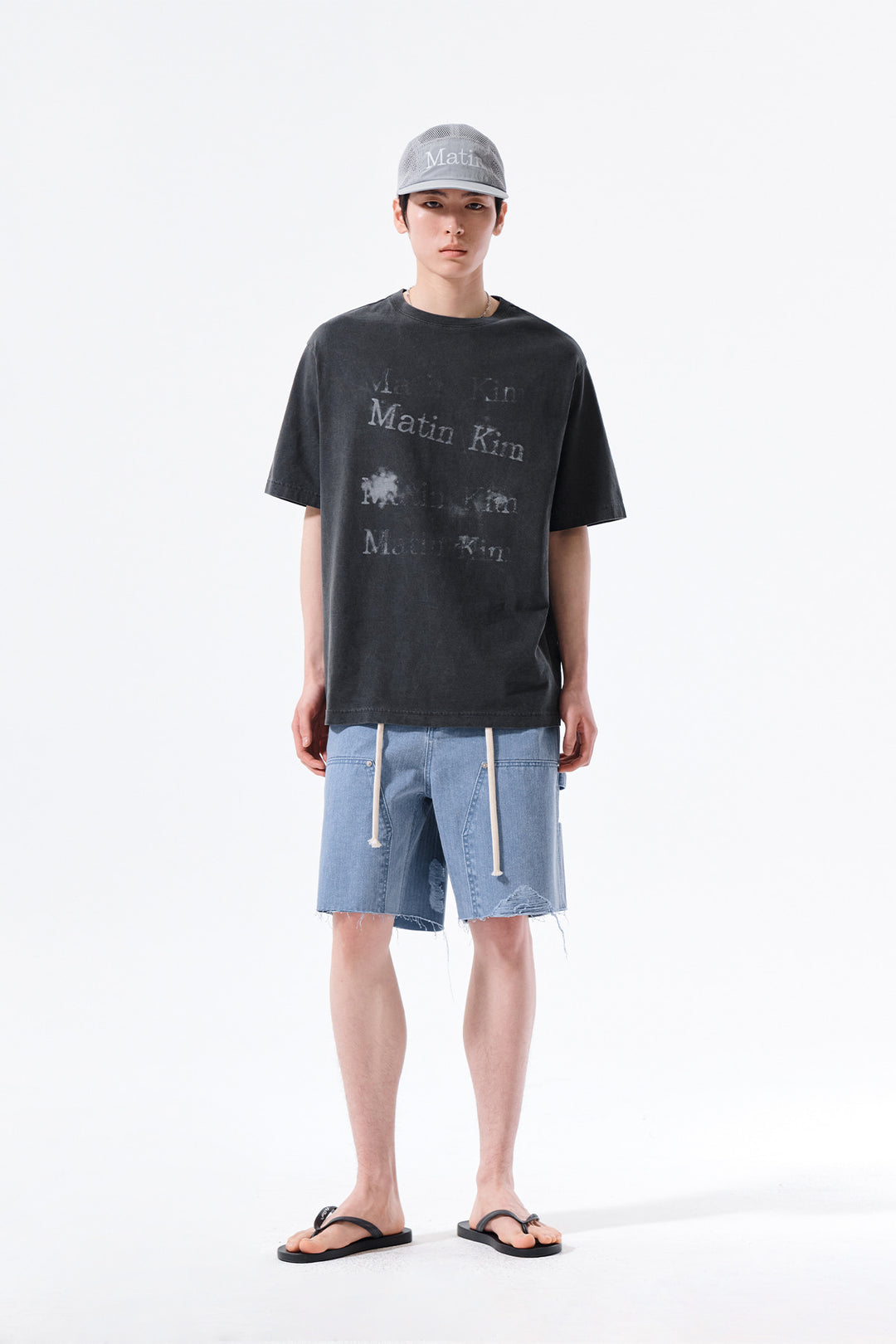 Matin Kim Herringbone Raw Cut Denim Shorts — Light Blue