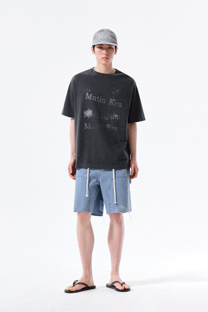 Matin Kim Herringbone Raw Cut Denim Shorts — Light Blue