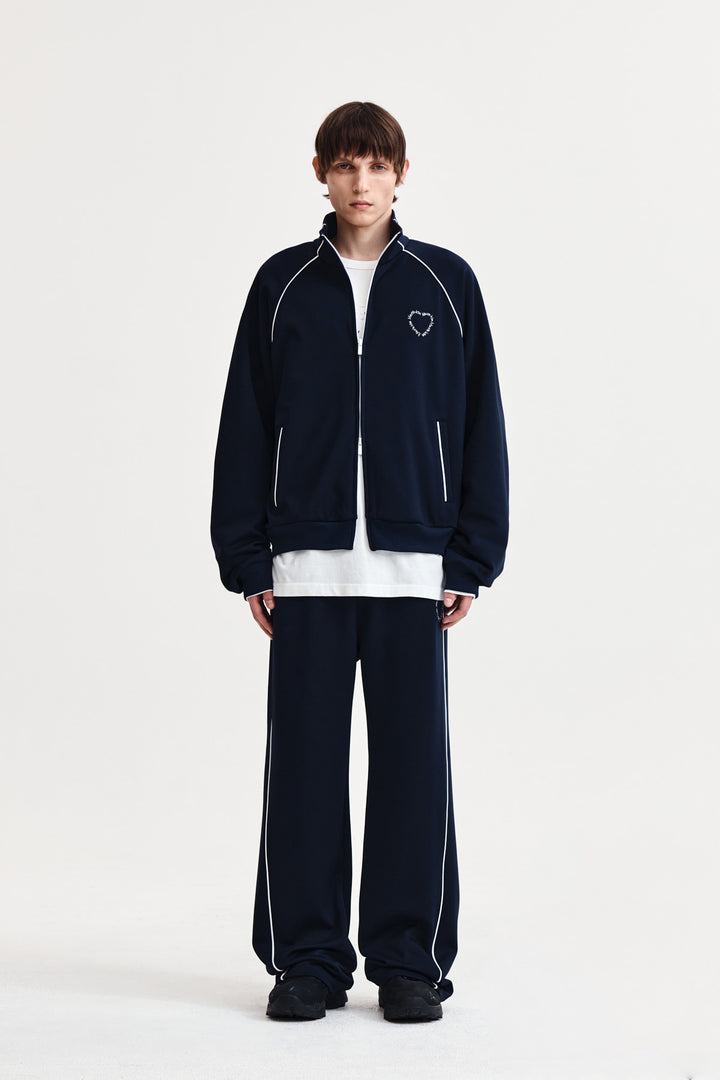 Matin Kim Heart Logo Track Pants — Navy blue