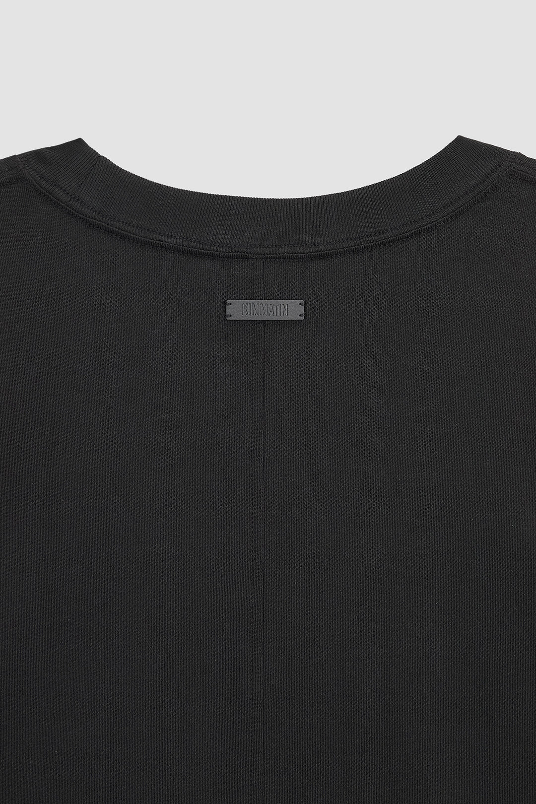 KIMMATIN Logo Embroidery Oversize Top — Black