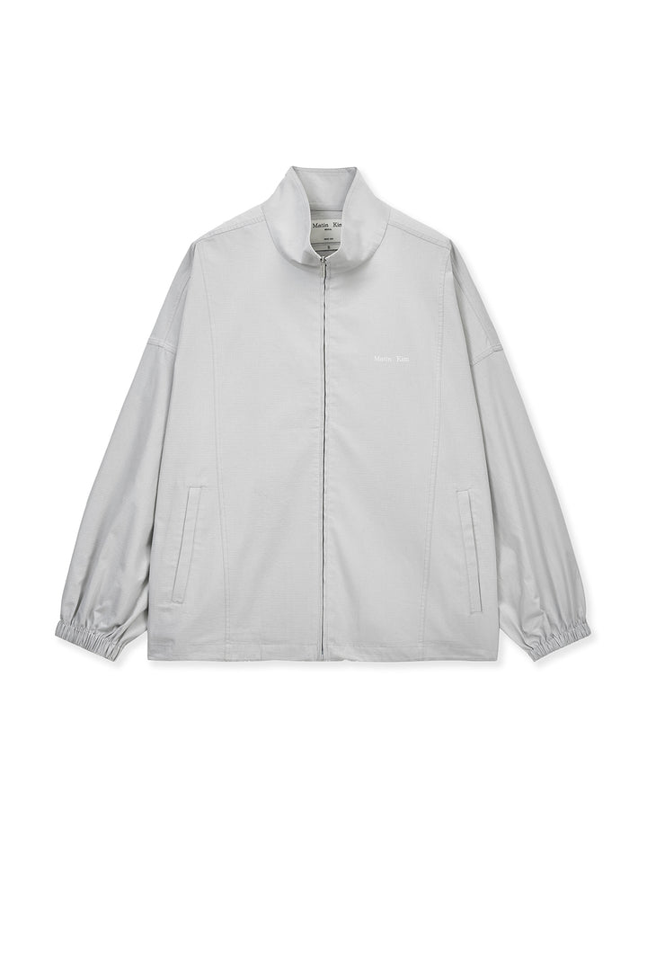 Matin Kim Back Logo High Neck Jumper — Light Grey
