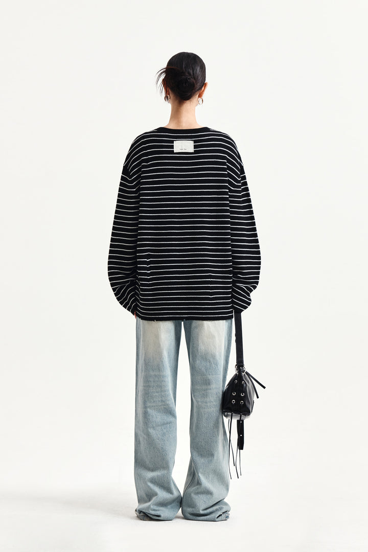 Matin Kim Stripe Damaged Loose Pullover — Black