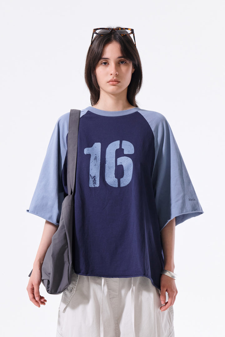 Matin Kim Raw Edge Raglan Top — Navy blue