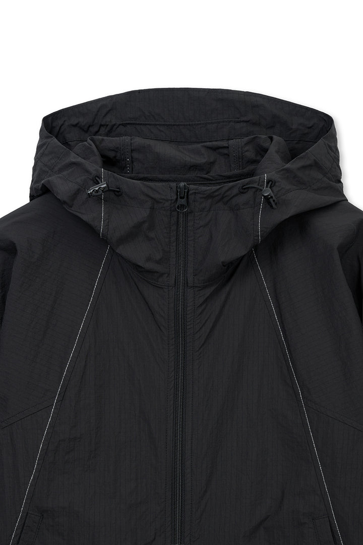 Matin Kim Cropped Back Logo Windbreaker — Black