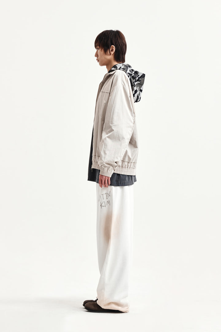 Matin Kim Embroidery Back Logo Jumper — Beige