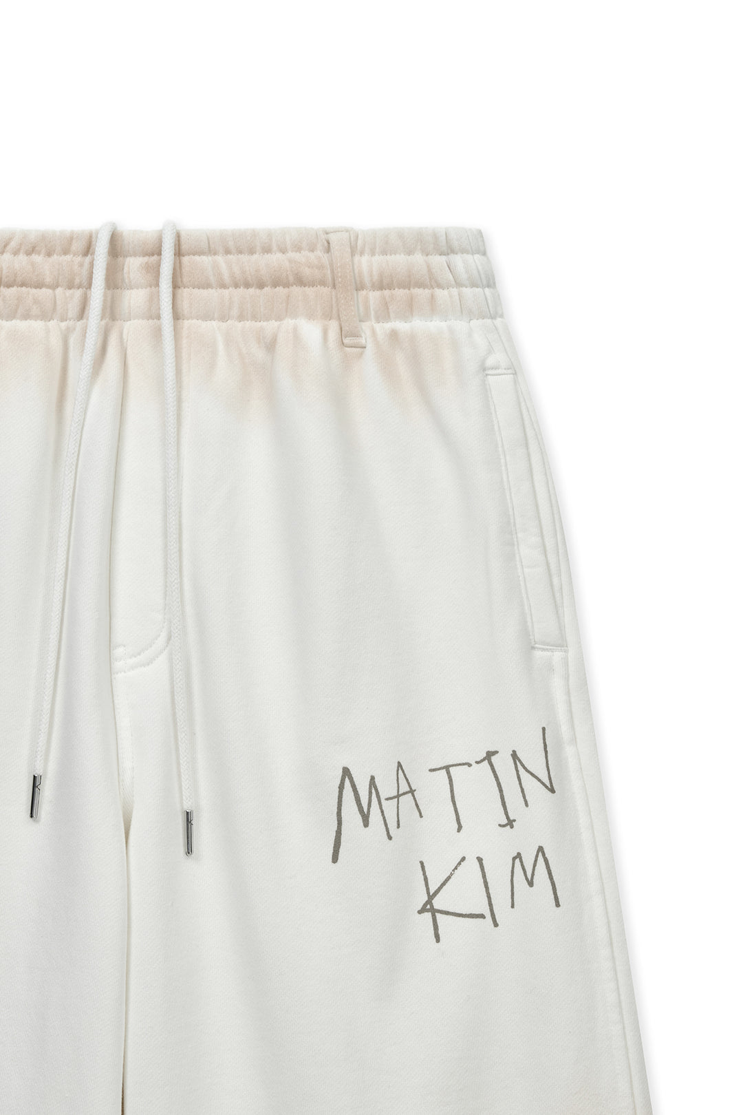 Matin Kim Vintage Washed Logo Sweatpants — Ivory