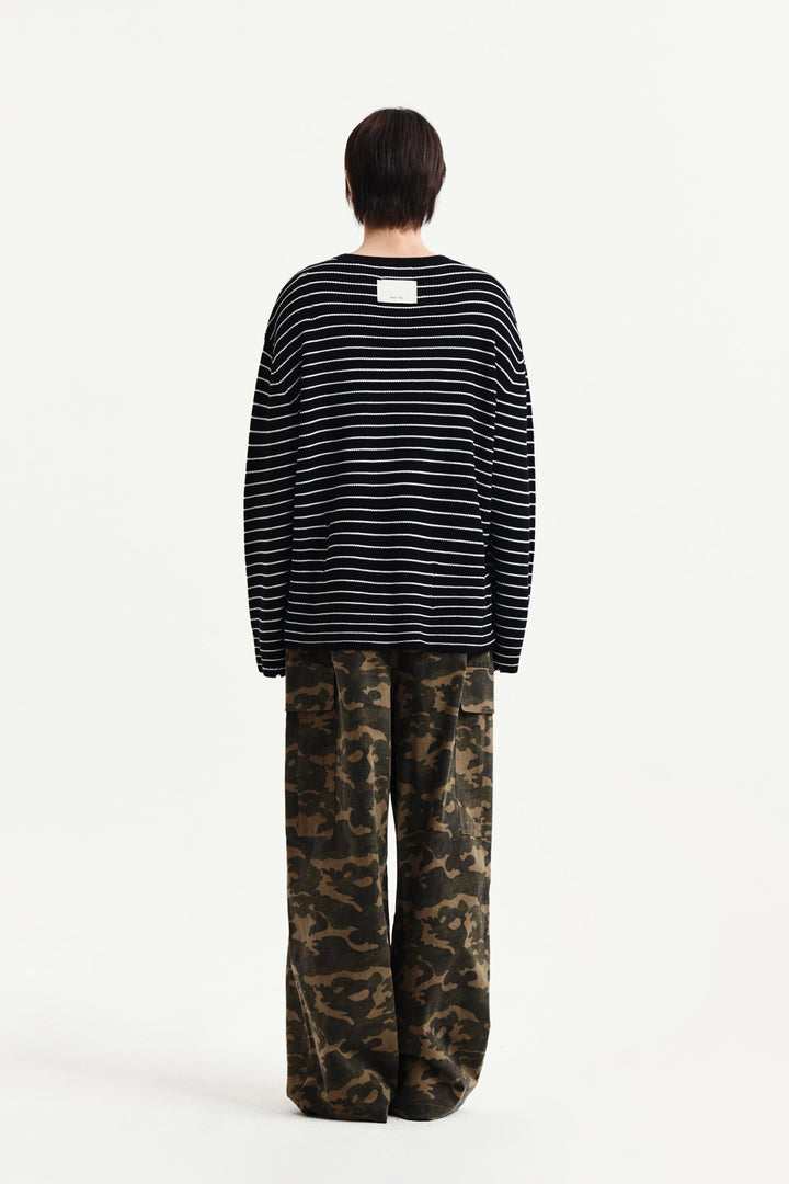 Matin Kim Stripe Damaged Loose Pullover — Black