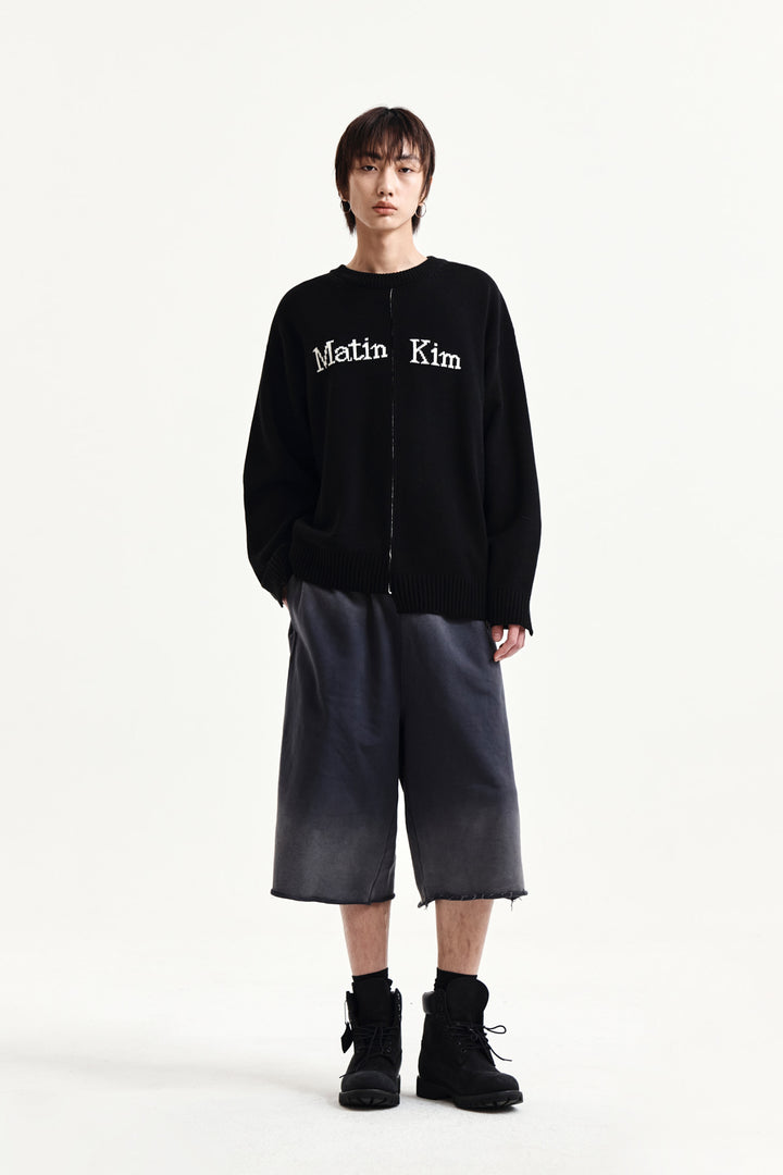Matin Kim Asymmetric Logo Knit Pullover — Black