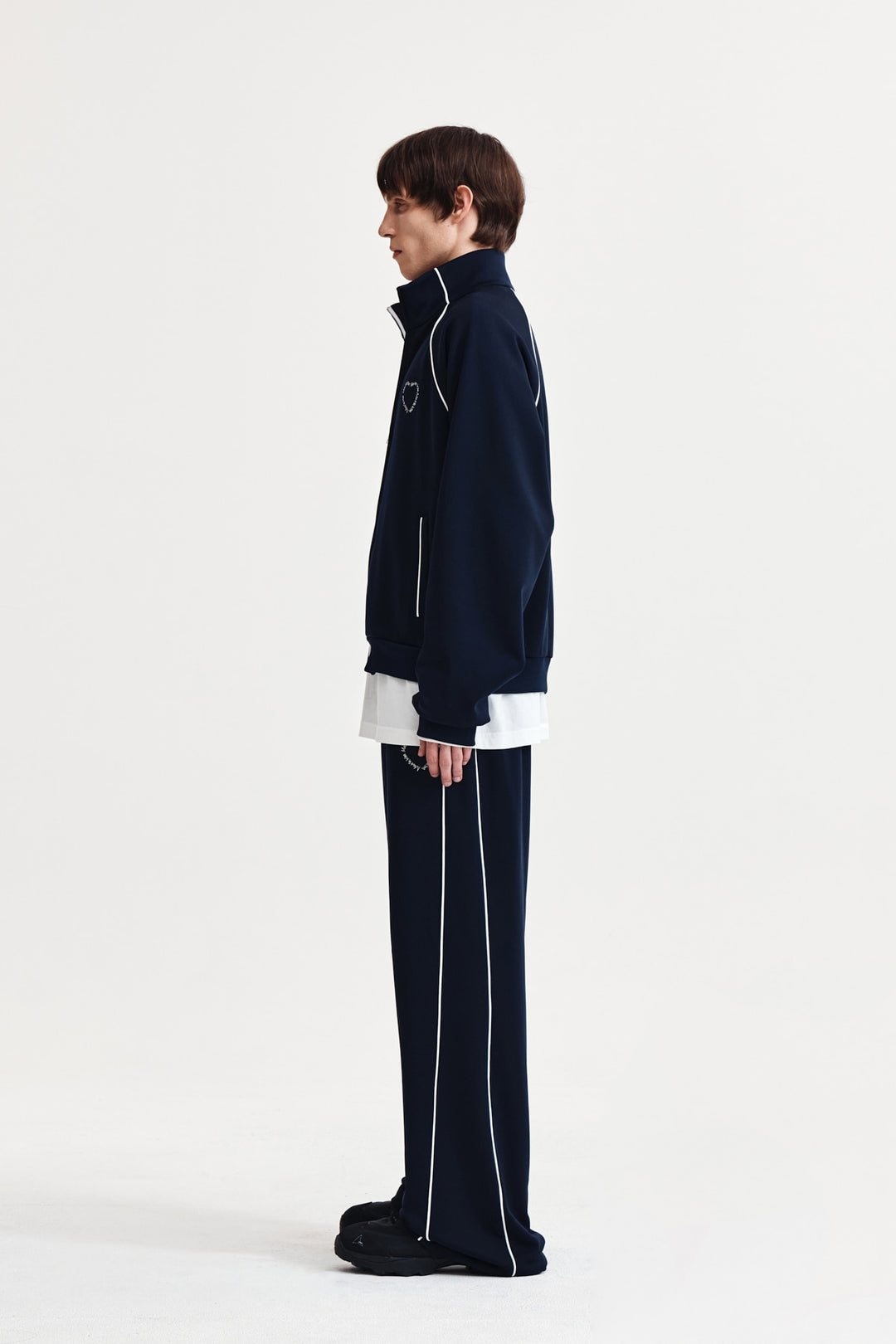 Matin Kim Heart Logo Track Pants — Navy blue