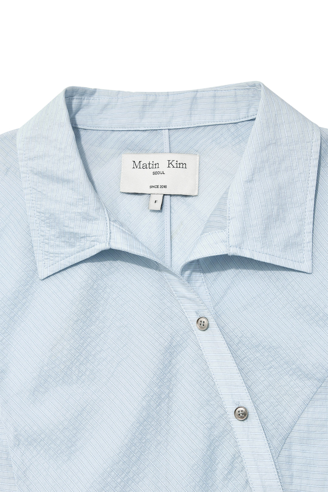 Matin Kim Unbalance Button Point Shirt — Light Blue