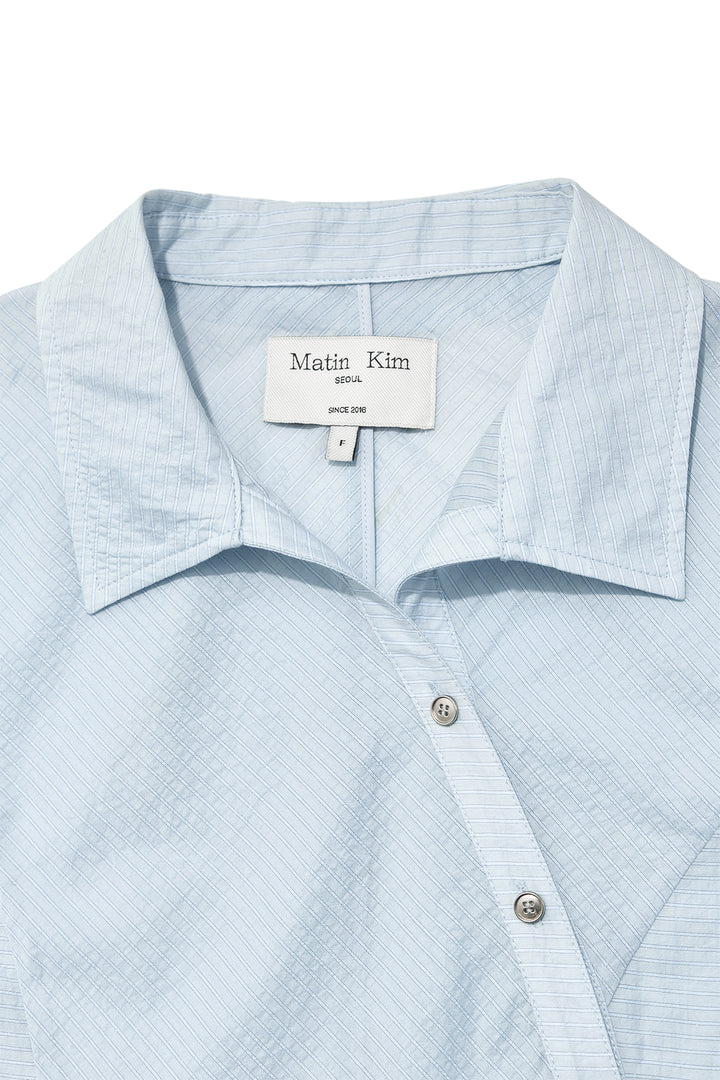 Matin Kim Unbalance Button Point Shirt — Light Blue