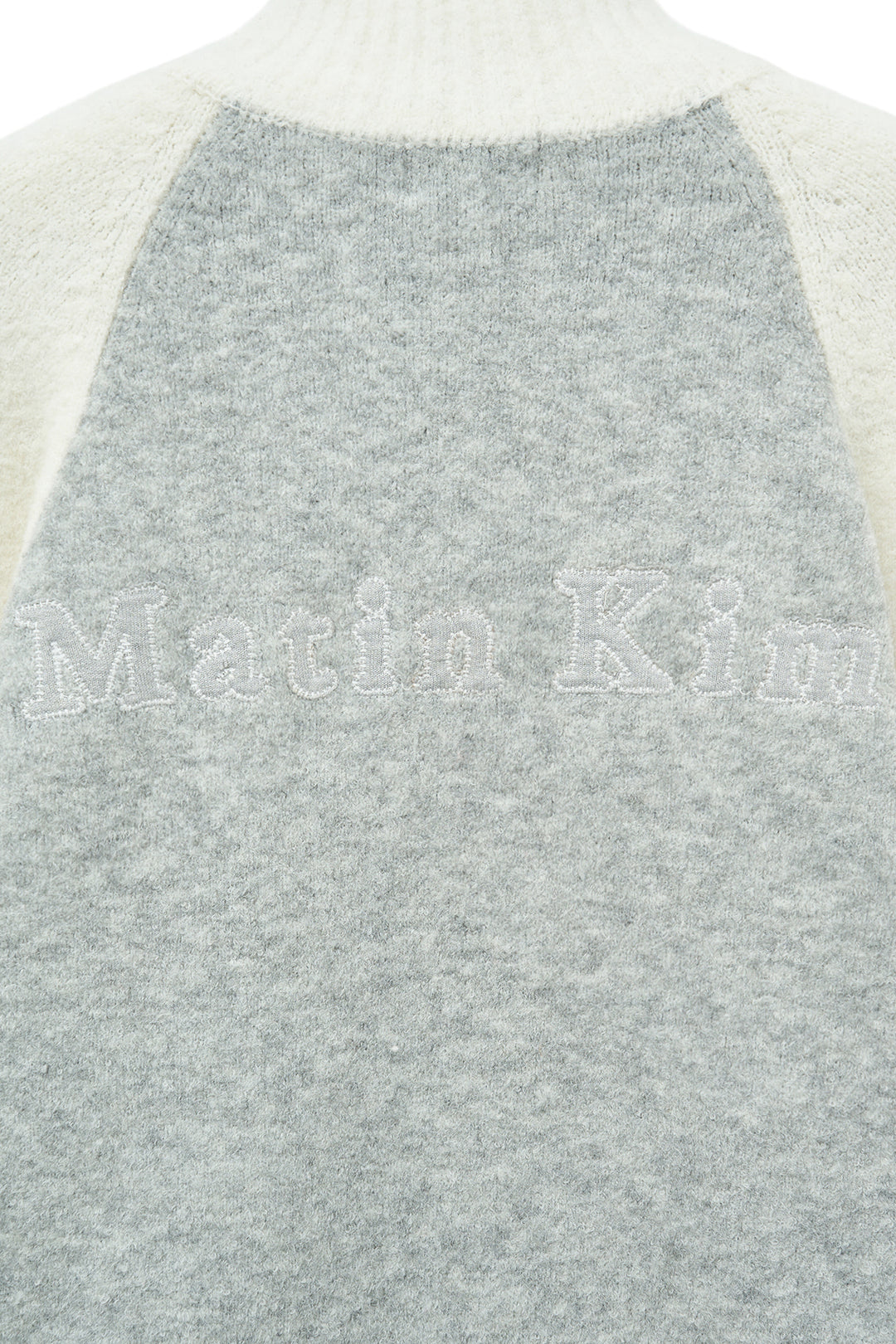 Matin Kim High Neck Raglan Zip Knit — Ivory