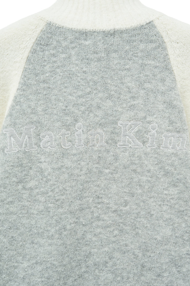 Matin Kim High Neck Raglan Zip Knit — Ivory