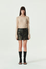 KIMMATIN Washed Faux Leather Mini Skirt — Brown